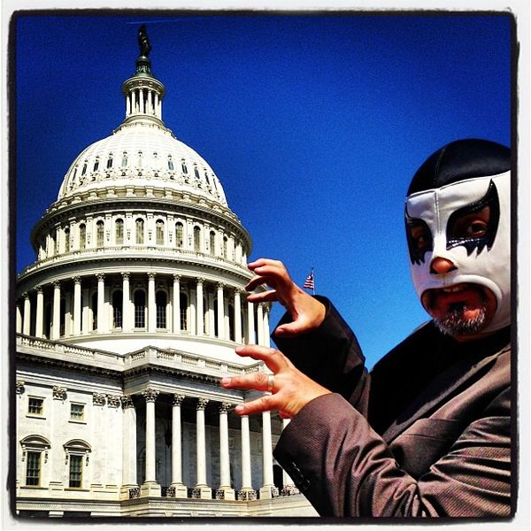 Masked Luchador Scales Capital Dome